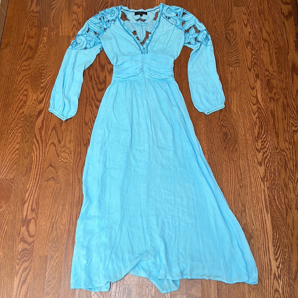 Goddess dress with elegant cropped out details throughout the sleeves and back